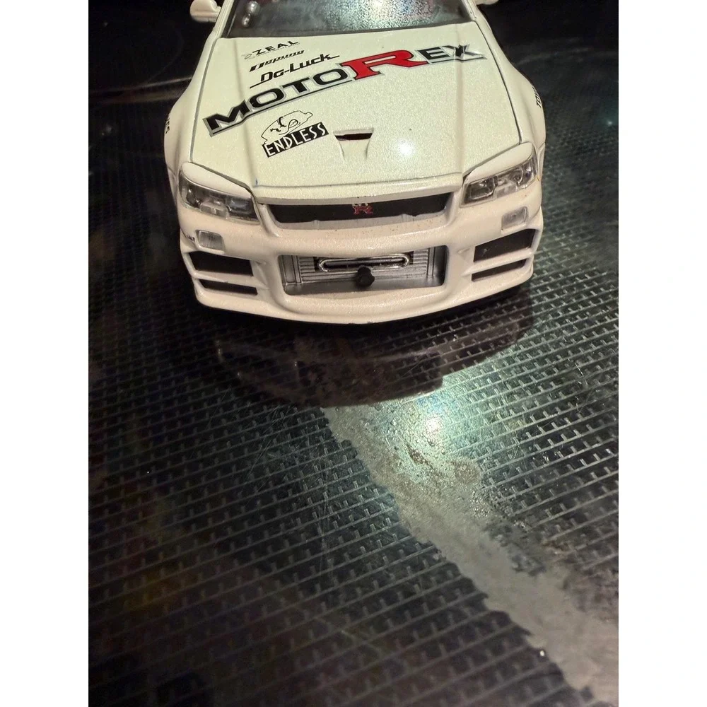 Jada Toys Import Racer Nissan Skyline GT-R R34 White MotoRex 1:24 Diecast Car